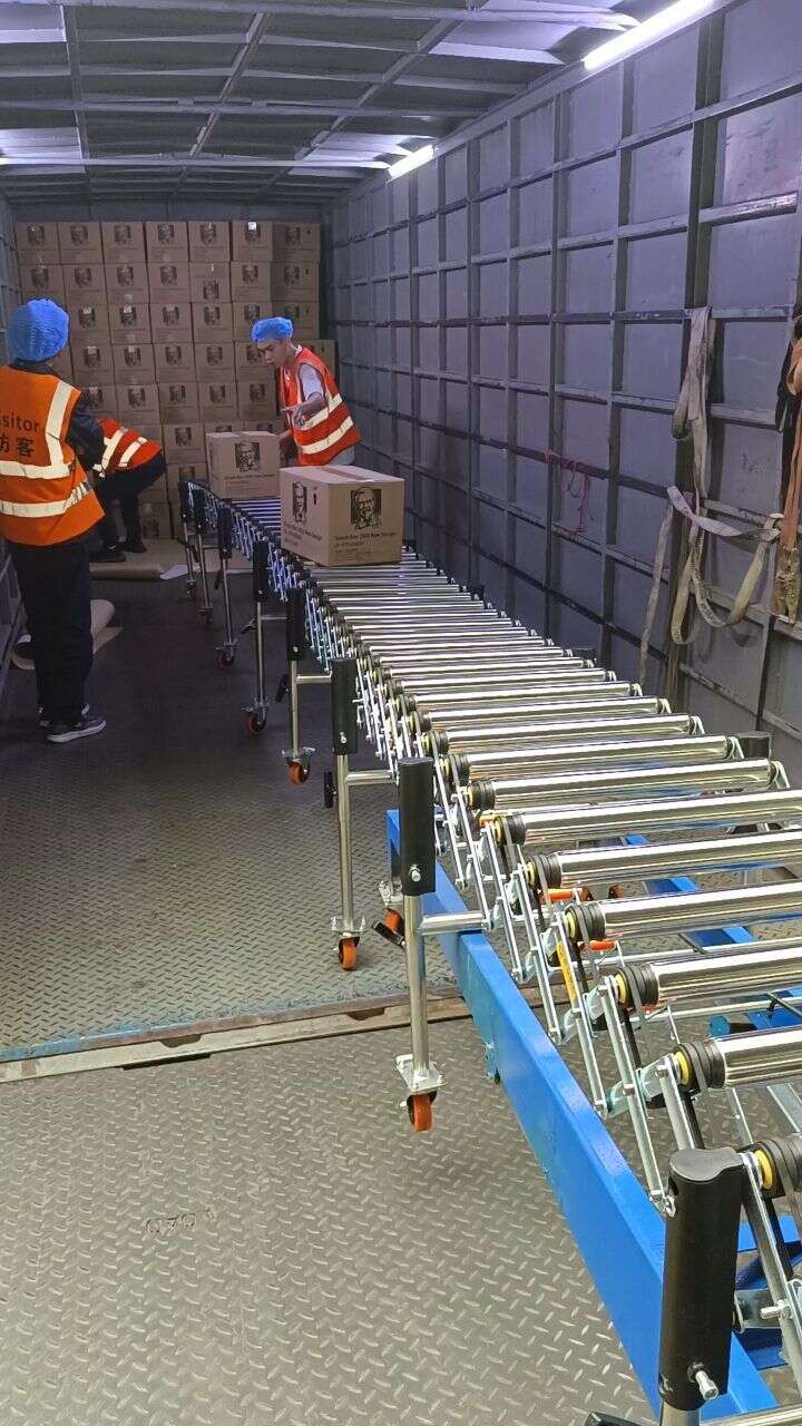 Field demonstration of continuous loading operations at a food raw material warehouse using a 60-meter Multi-Wedge Belt Powered Roller Conveyor and a Medium Hydraulic Conveyor