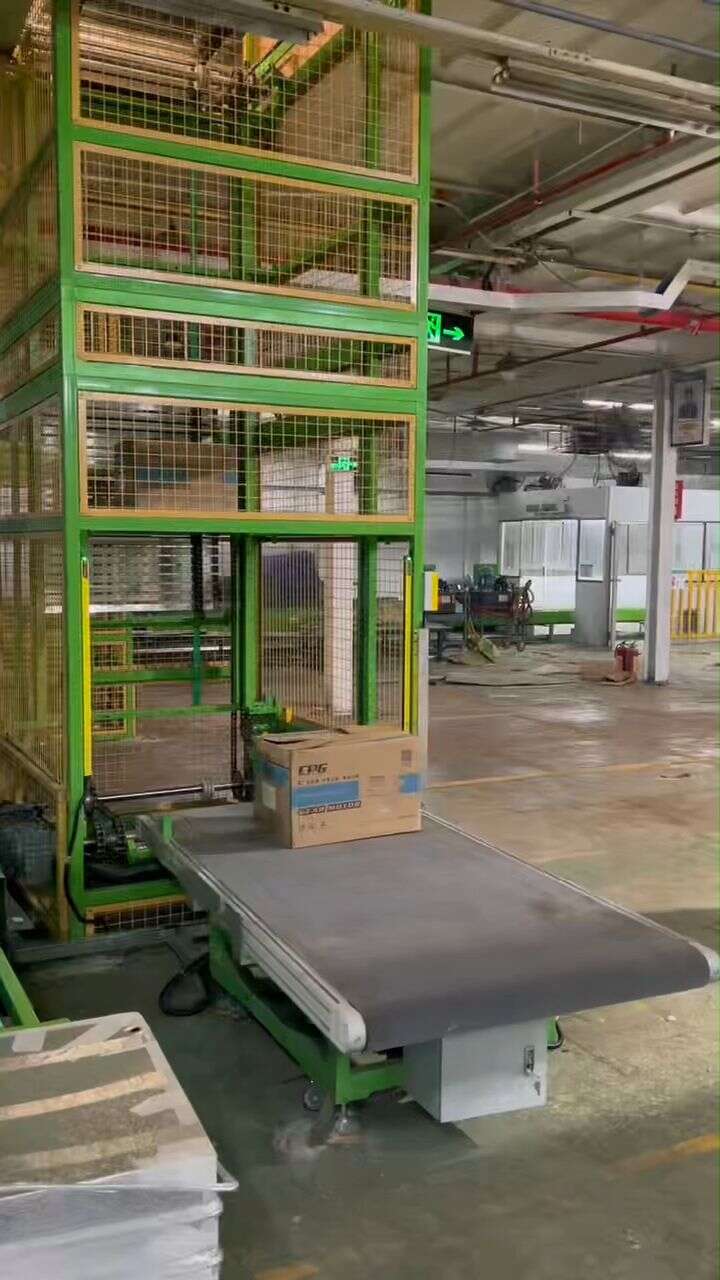 Carton Vertical Conveyor conveying cross-floor transport (2)
